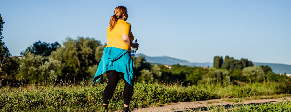 Young Overweight Woman Running